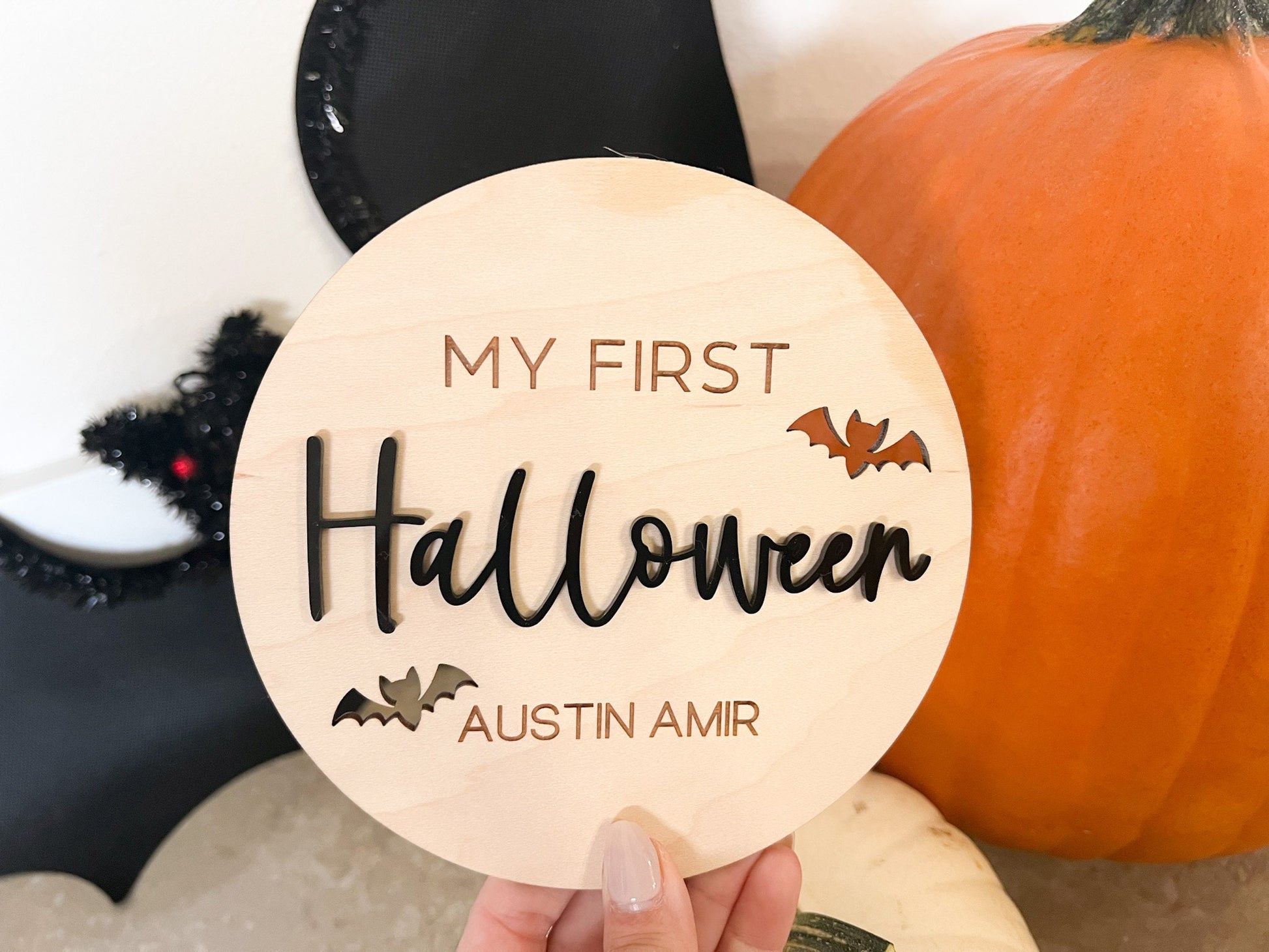 Newborn Keepsake Sign featuring the phrase "My First Halloween" with engraved bat cutouts and custom name engraving.