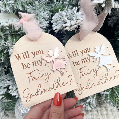 Two Fairy Godmother Proposal Ornaments side-by-side, showcasing different acrylic fairy color options (e.g., silver mirror and white).