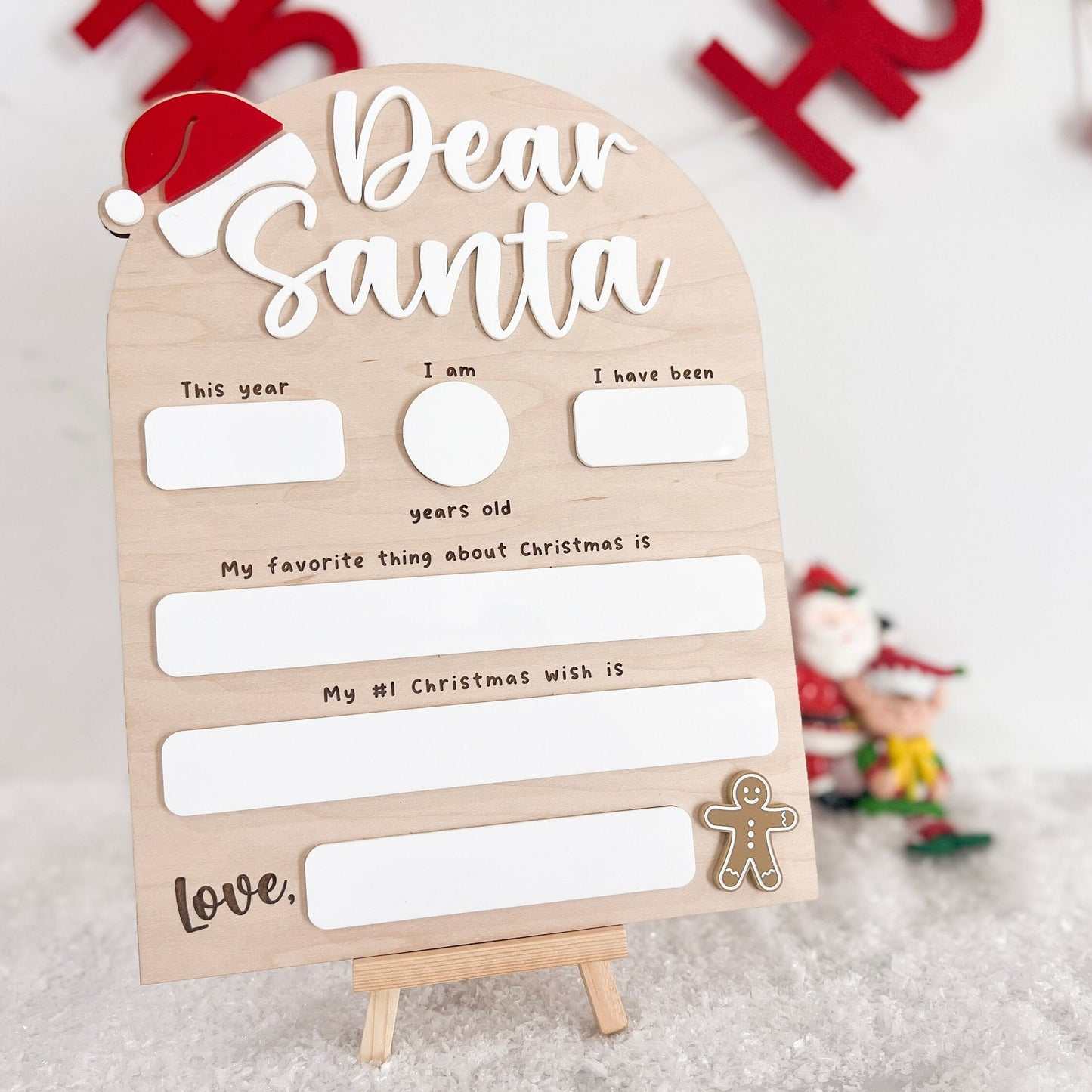 Close-up of the Reusable Christmas Board detailing the laser-engraved fields for age, height, and Christmas wishes.