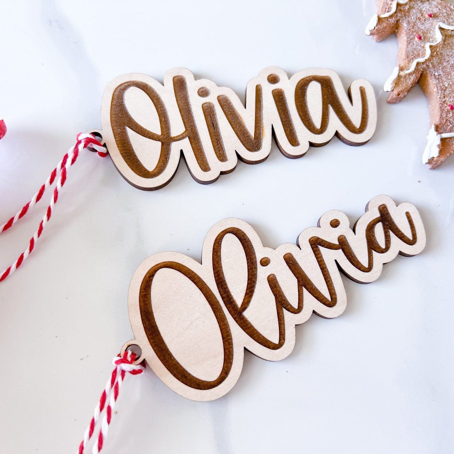 Two Custom Name Gift Tags side-by-side: one in the script font and one in the block font, illustrating the font choices.