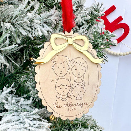 Detail of the Custom Family Ornament showing the crisp laser engraving of the wood and the 3D layered bow accent on the maple plywood base.