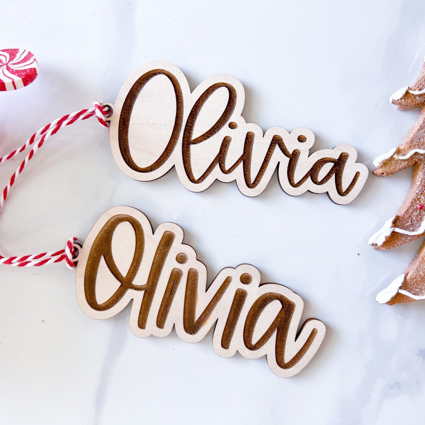Two Custom Name Gift Tags side-by-side: one in the script font and one in the block font, illustrating the font choices.