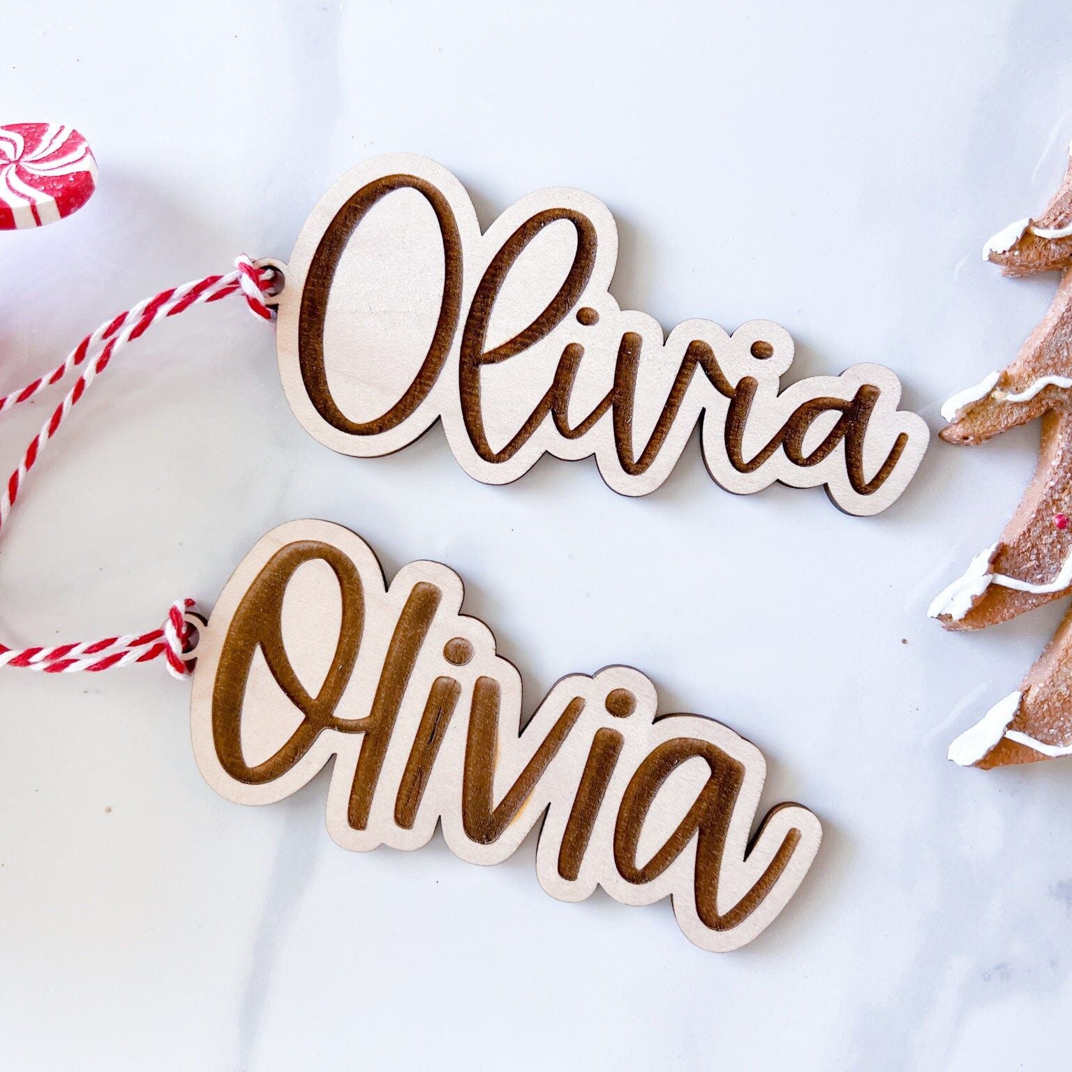 Two Custom Name Gift Tags side-by-side: one in the script font and one in the block font, illustrating the font choices.