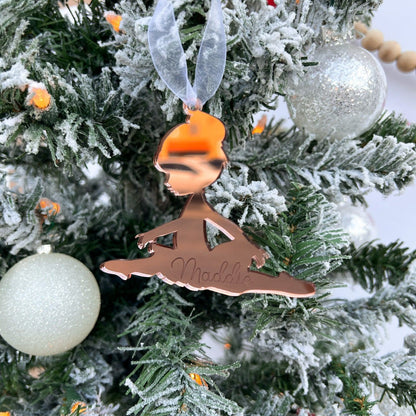 Engraved Ballet Ornament attached as a premium gift tag to a dance present, highlighting its use as a dance recital gift.