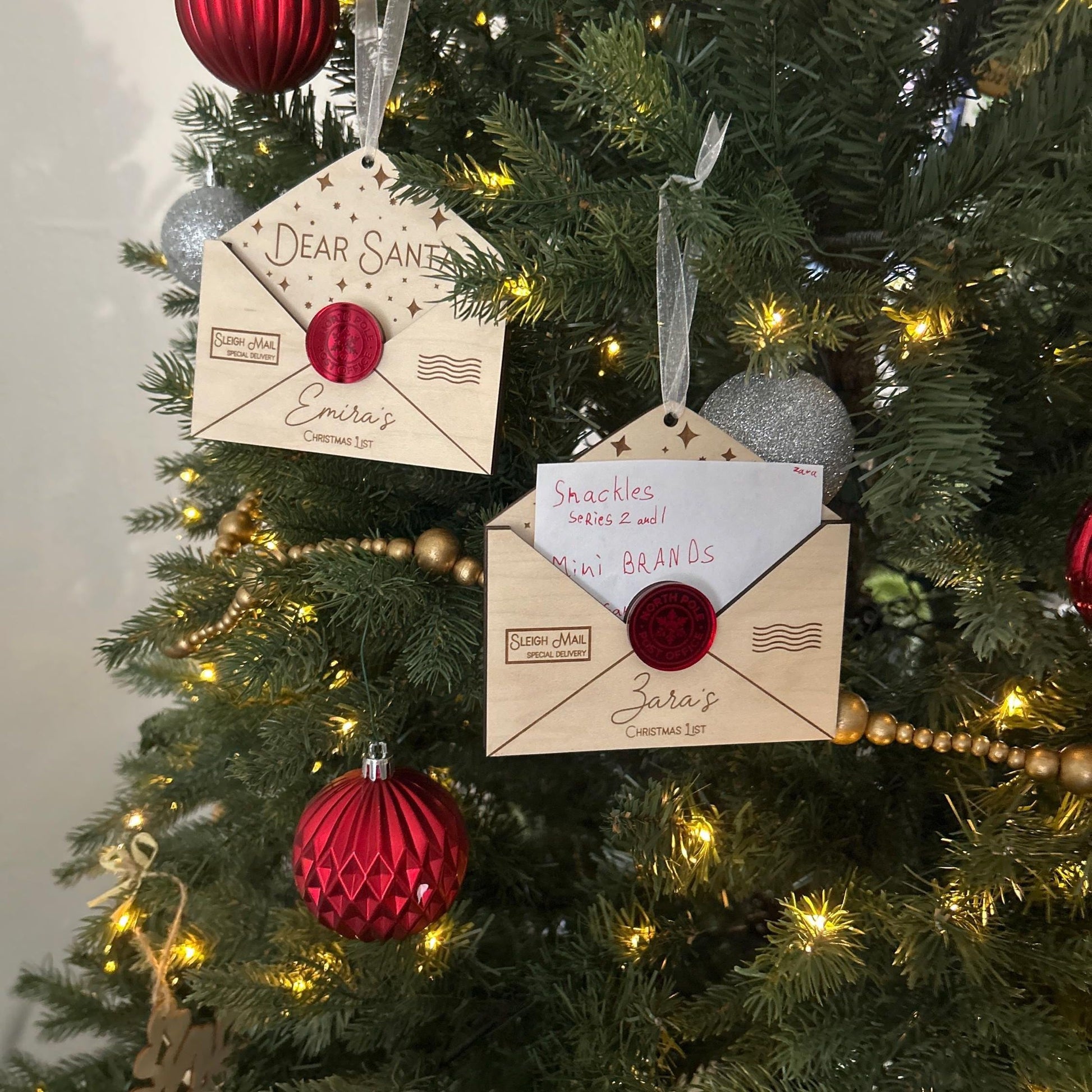 Two Custom Santa Letter Keepsake showing the blank space reserved for a handwritten note or wish list entry.