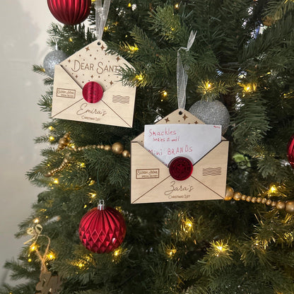 Two Custom Santa Letter Keepsake showing the blank space reserved for a handwritten note or wish list entry.