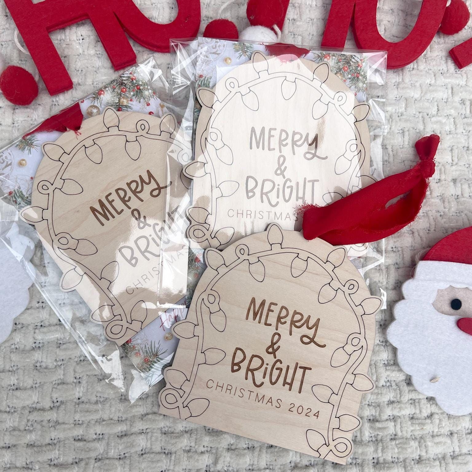 Classroom Christmas Gift Idea ornament hung on a tree, illustrating its use as a sentimental keepsake and its size (4.6 inches).