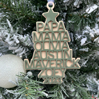 Overhead view of the Layered Wooden Keepsake illustrating the Christmas tree shape formed by the names and the custom acrylic color choice.