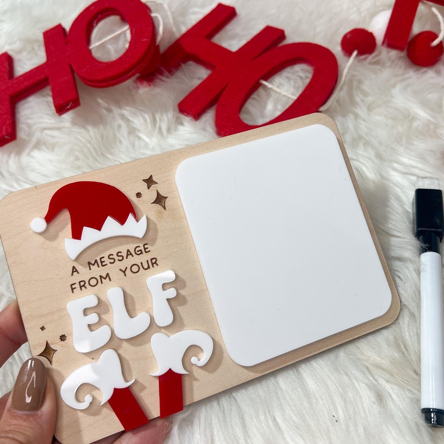 Small Reusable Elf Sign displayed on a miniature easel prop, demonstrating the perfect size for an Elf on the Shelf display.