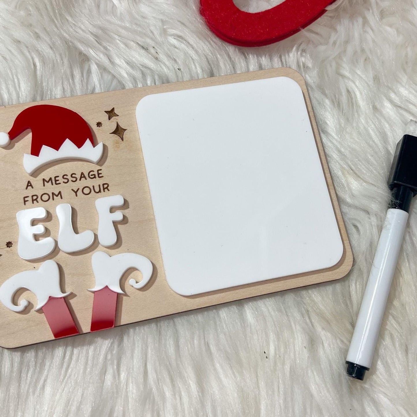 Small Reusable Elf Sign displayed on a miniature easel prop, demonstrating the perfect size for an Elf on the Shelf display.